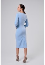 Блакитна сукня облягаюча по фігурі