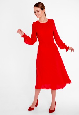 Яскрава червона сукня міді