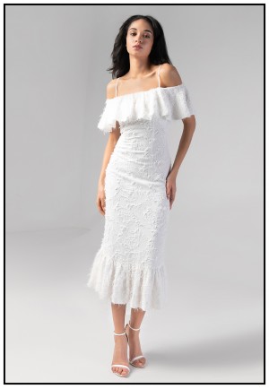Коктейльна біла сукня з воланами